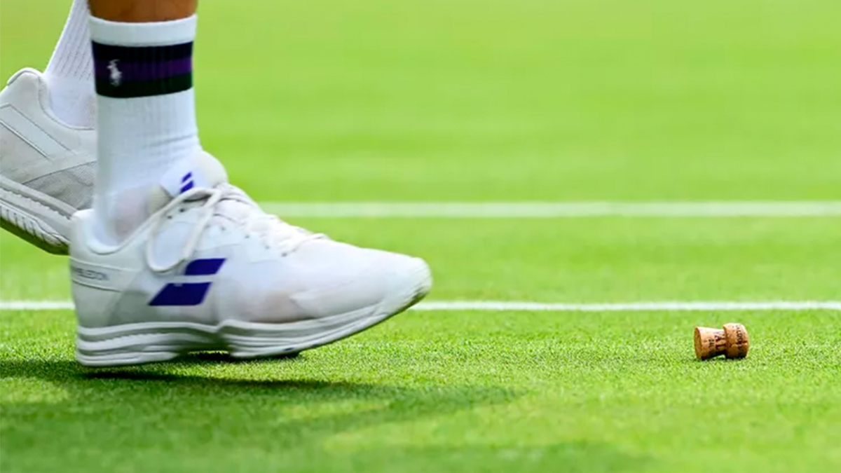 The most ironic caution in Wimbledon history involves a bottle of champagne