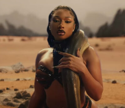 Megan Thee Stallion tastes a Japanese liquor with a snake in it